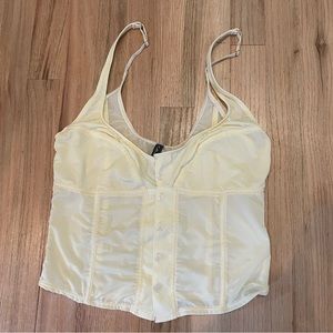 Cute light yellow bustier style top